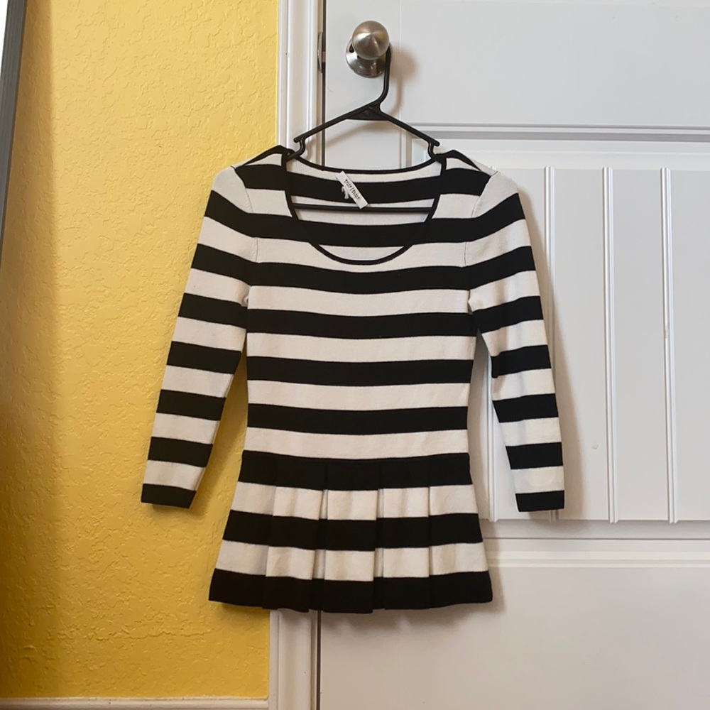 This shirt is a tighter shirt and a thick material